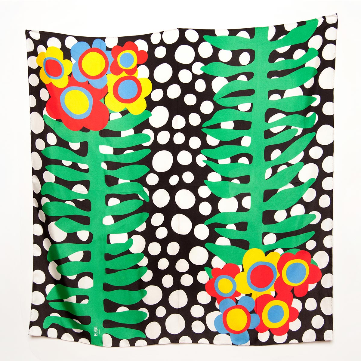 ELOI scarves, made from paper cut-out designs.